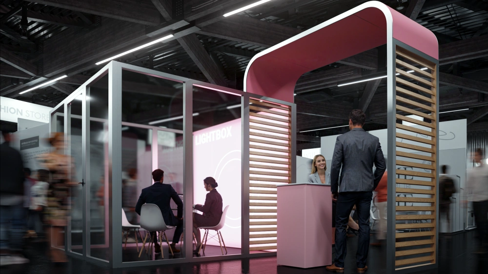 Stoisko modułowe z nowoczesnym zadaszeniem i podświetlanym panelem, tworzące komfortową przestrzeń do rozmów i prezentacji oferty.