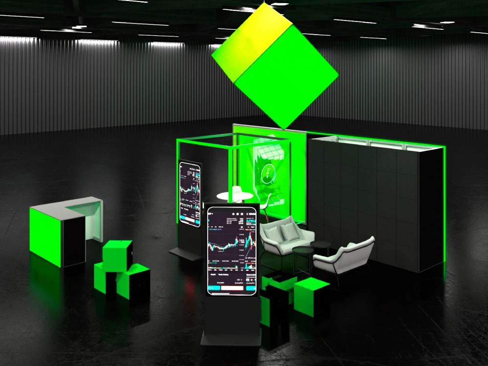 Nowoczesne stoisko targowe z dominującym motywem neonowej zieleni, wyposażone w podświetlane elementy, ekrany multimedialne i strefę lounge.