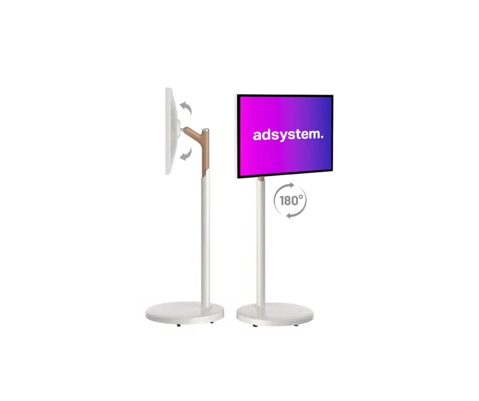 Infokiosk adVideo Stand 32’ pokazany z boku i z przodu, z widocznymi ikonami regulacji kąta nachylenia i obrotu ekranu o 180 stopni. Ekran wyświetla logo adsystem na tle gradientu fioletowo-różowego.