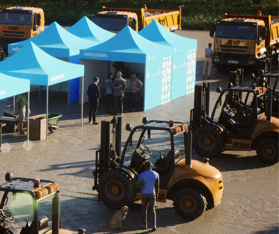 file-meta-description.namiotyreklamoweadsystemnatargachbranżowych,ustawioneobokmaszynrolniczychibudowlanych,zuczestnikamirozmawiającymiprzystoisku.